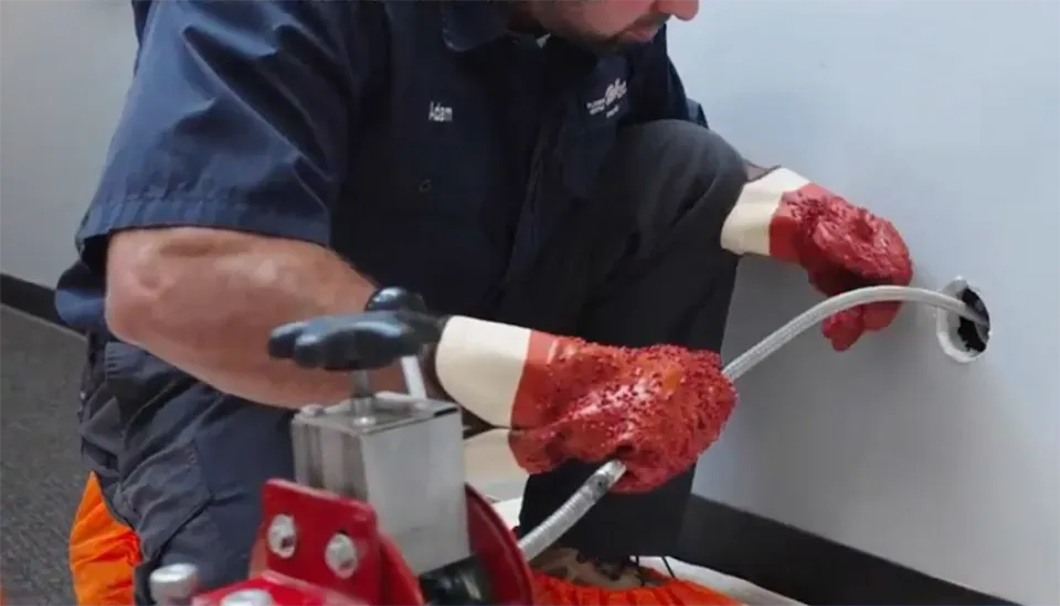 Technician drain cleaning