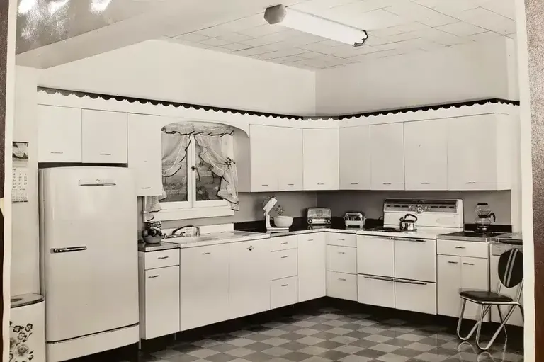 a vintage kitchen photo in black and white