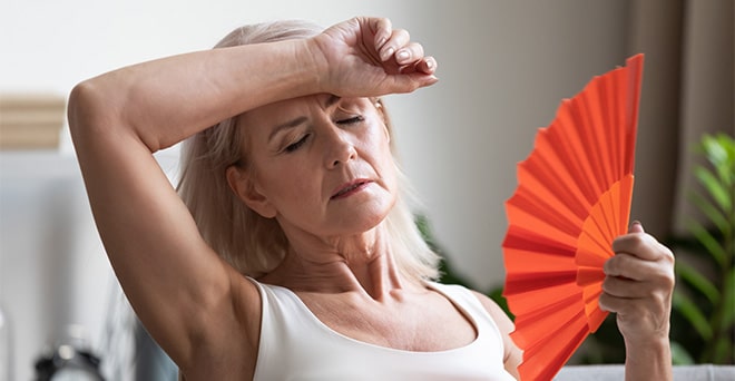 woman with a fan