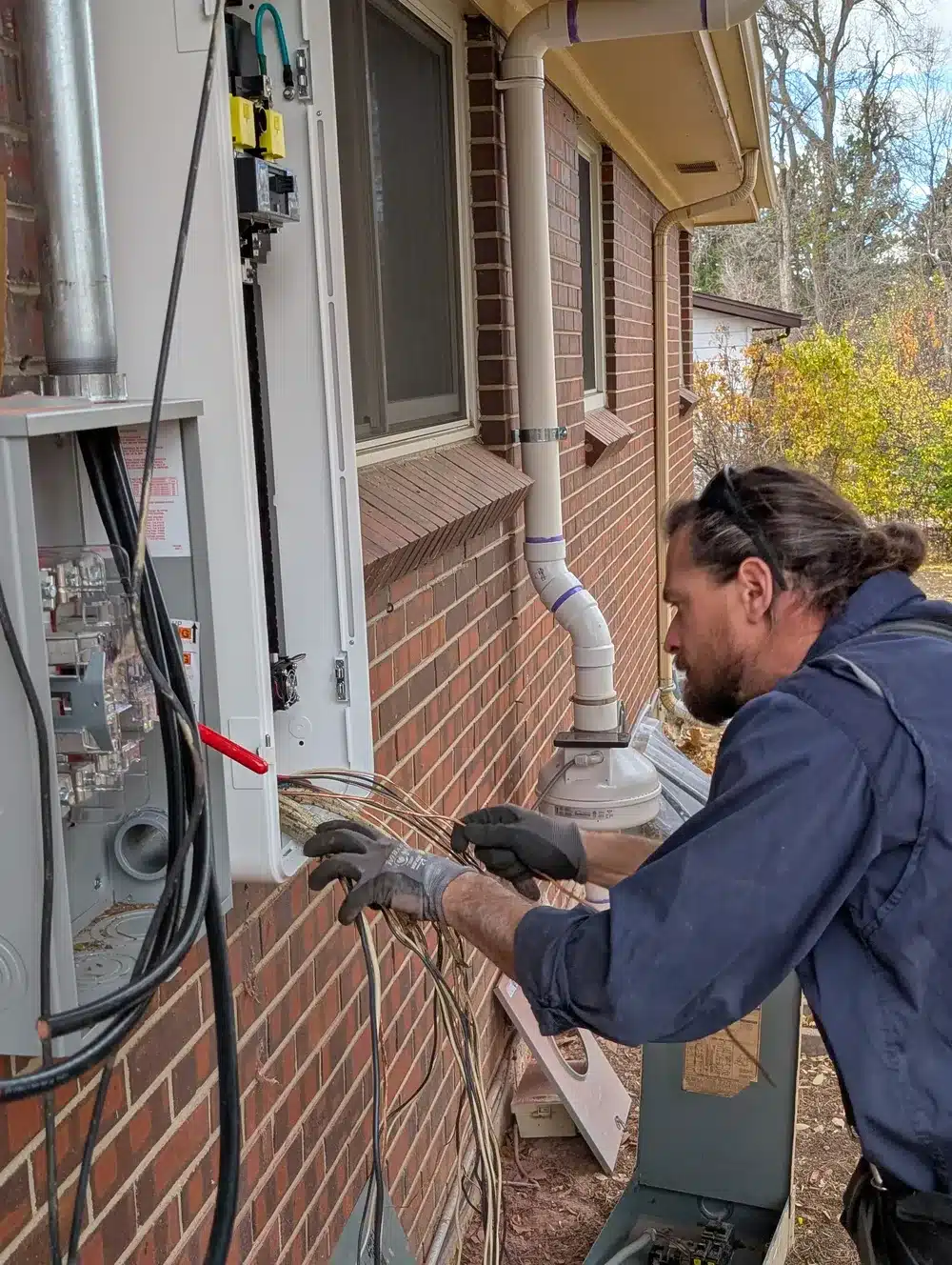 Electrician rewiring in Denver, CO