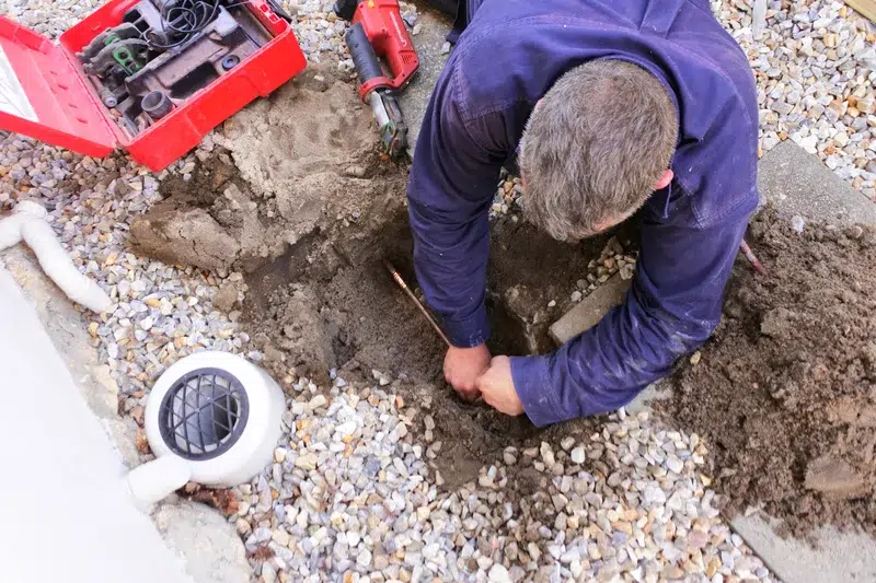 Technician repairing sewer line in Denver