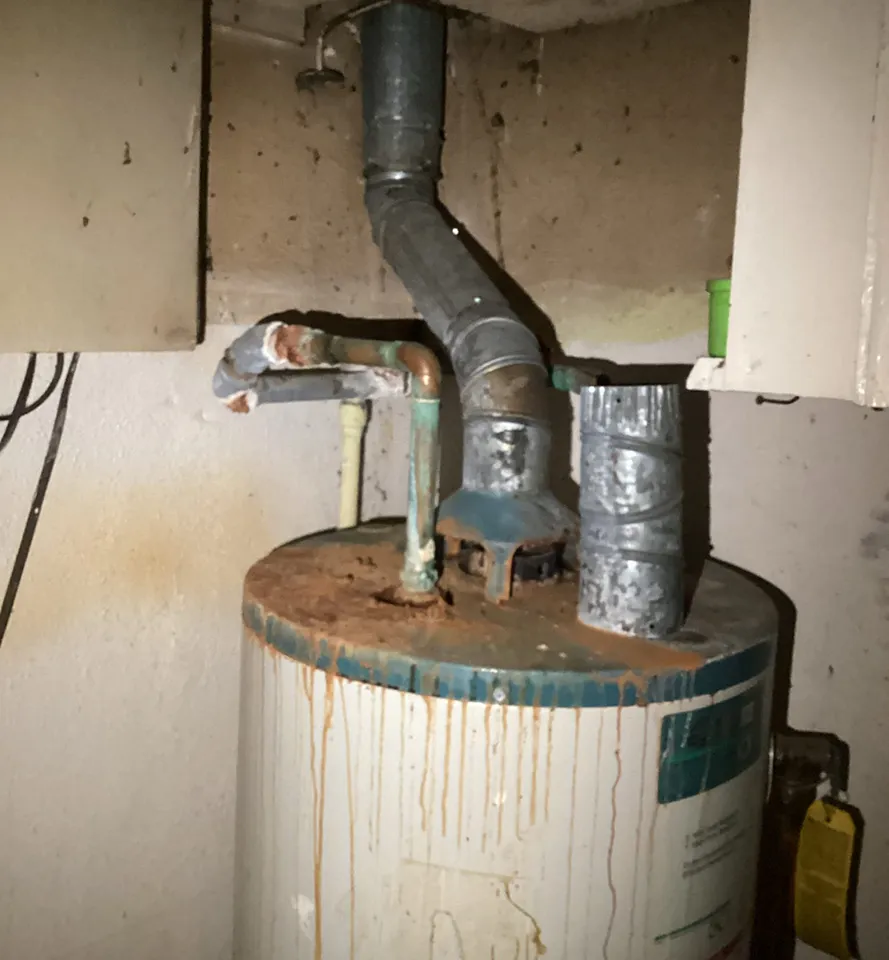 Old, dusty water heater